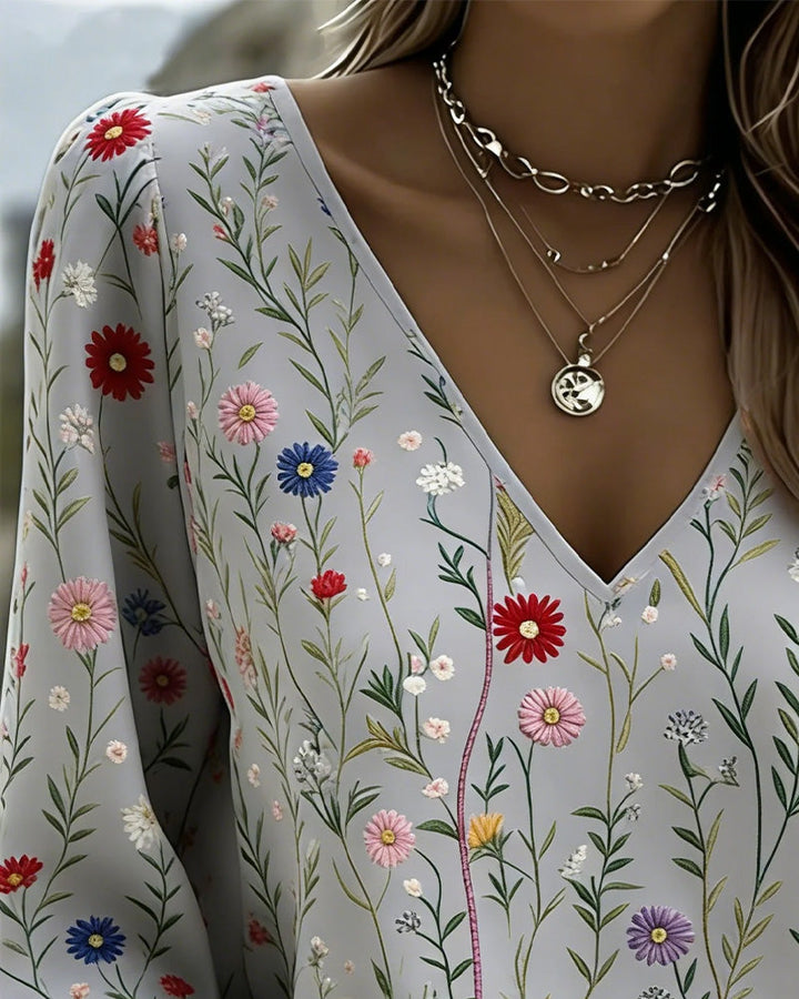 V-hals blouse met bloemenprint en pofmouwen