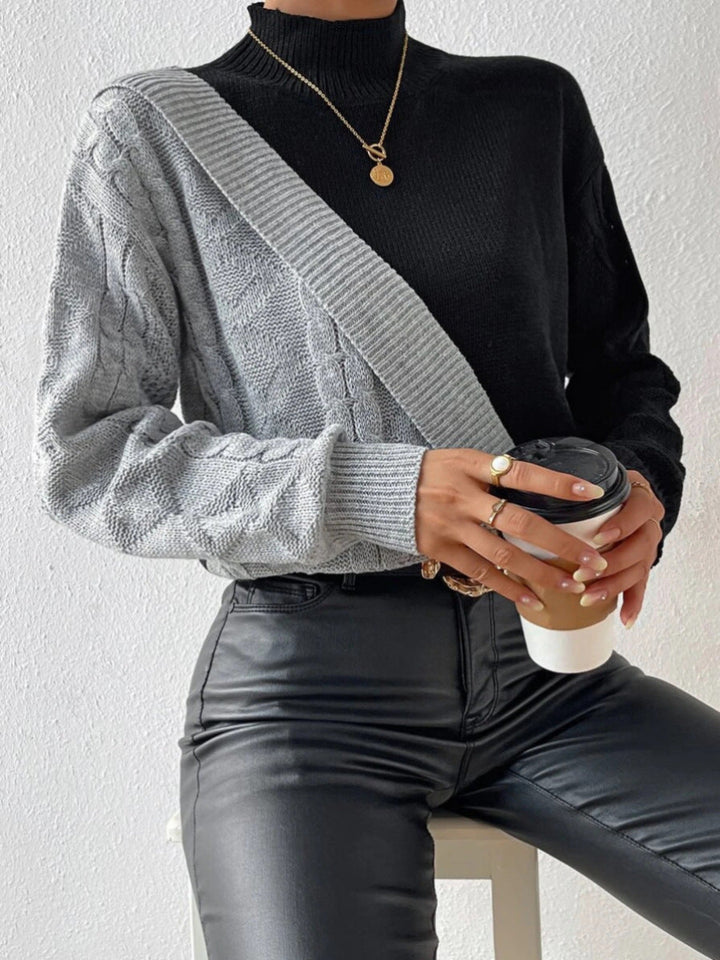 Dames twisted sweater met hoge kraag
