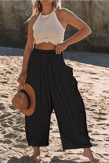 Pantalons met elastische taille, geplooid en met wijde pijpen