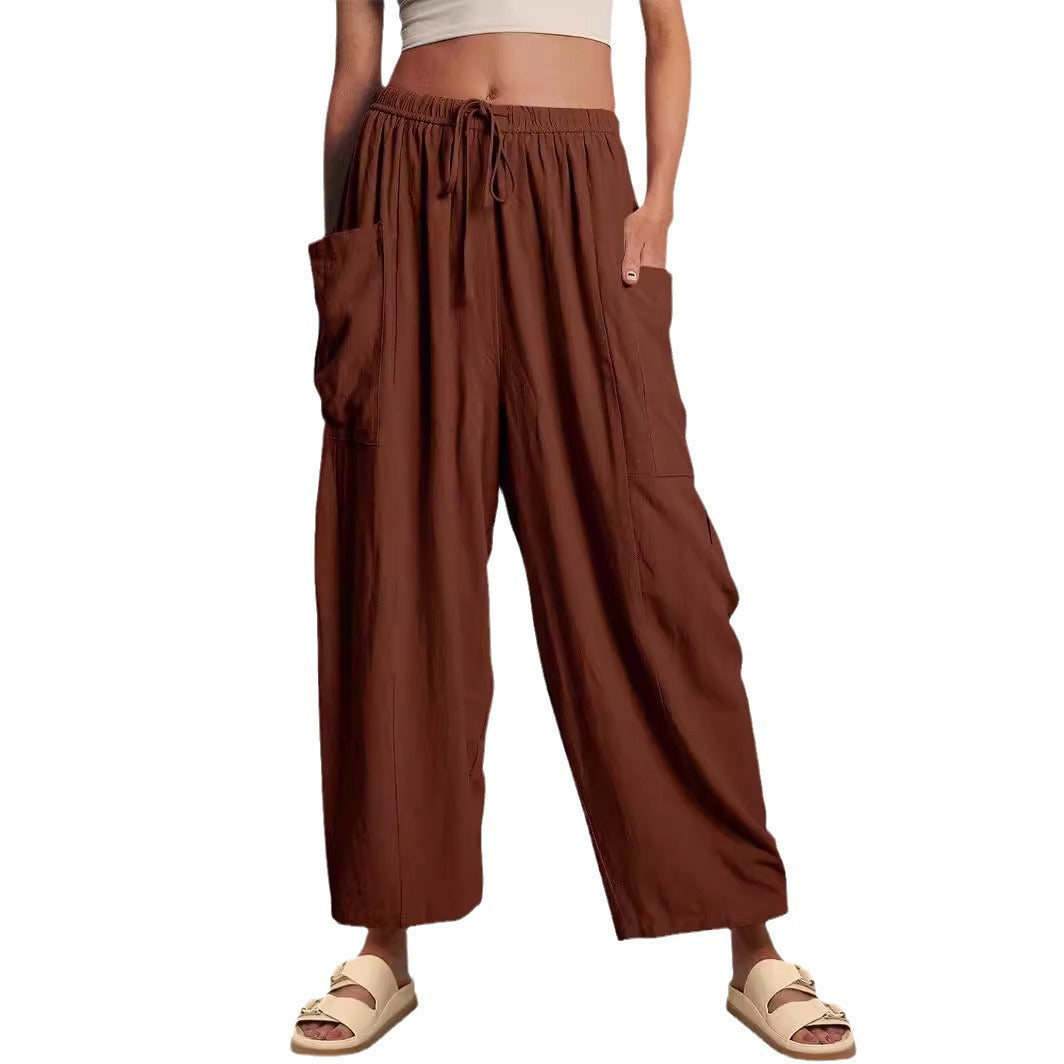 Pantalons met elastische taille, geplooid en met wijde pijpen