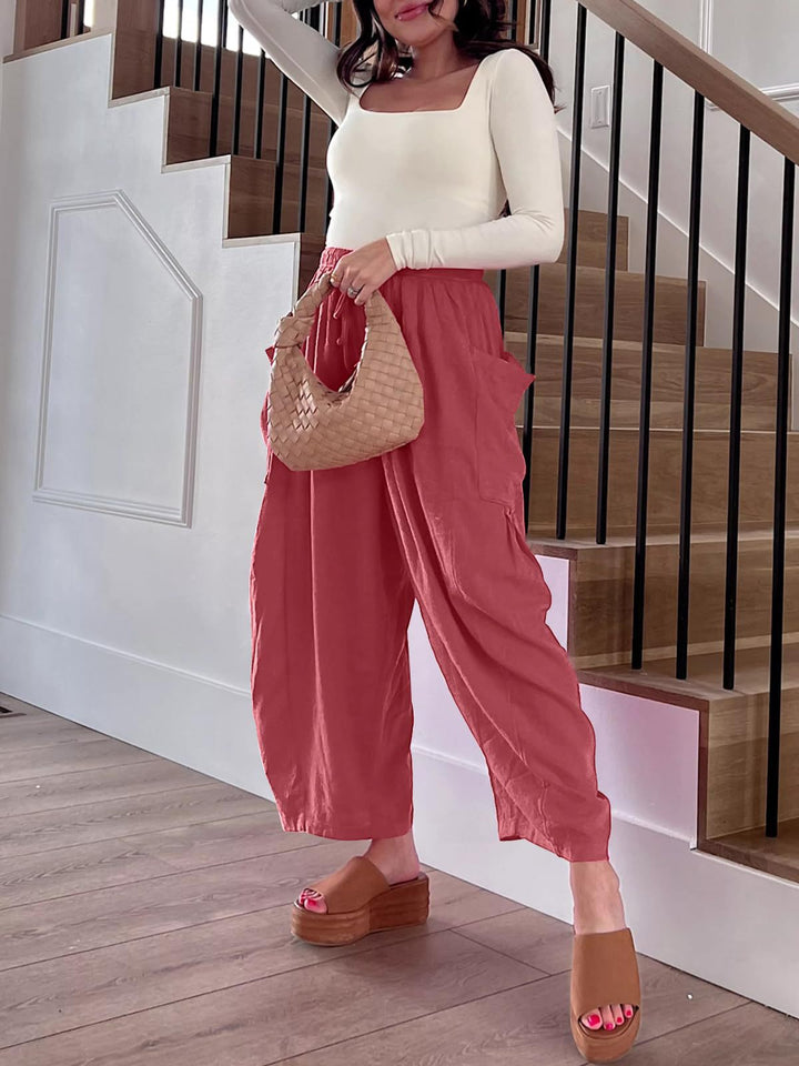 Pantalons met elastische taille, geplooid en met wijde pijpen