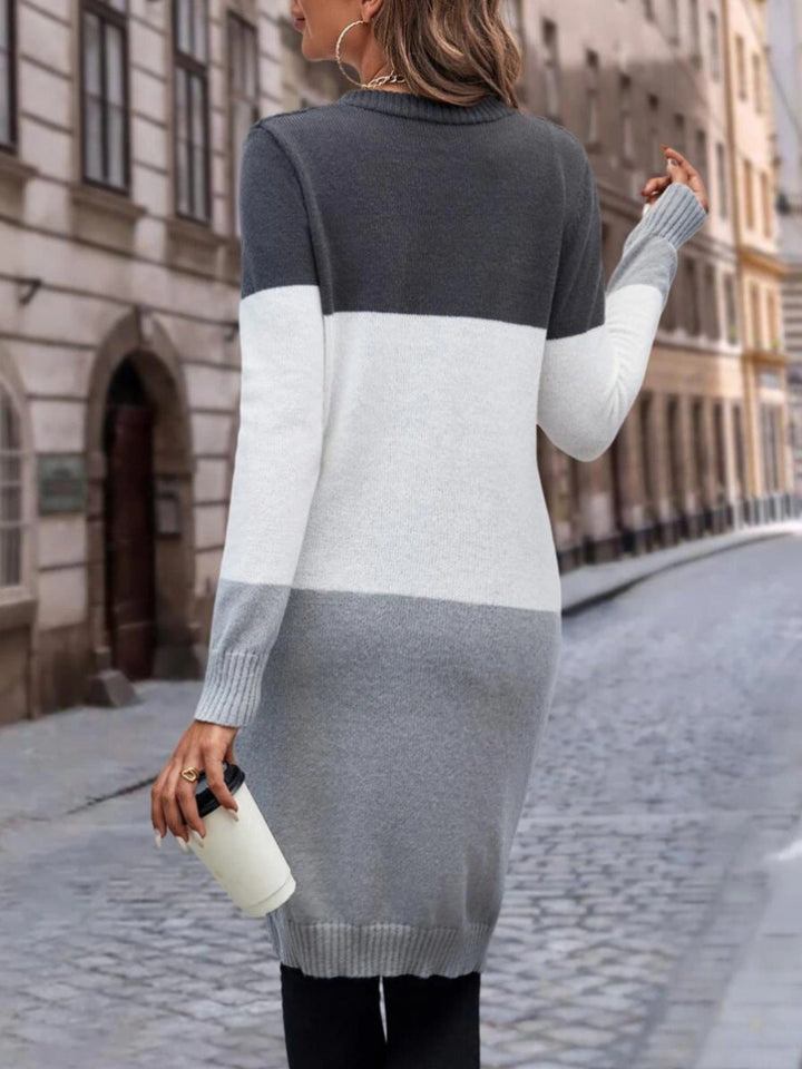 Kabelgebreide longline V-hals cardigan met colour block