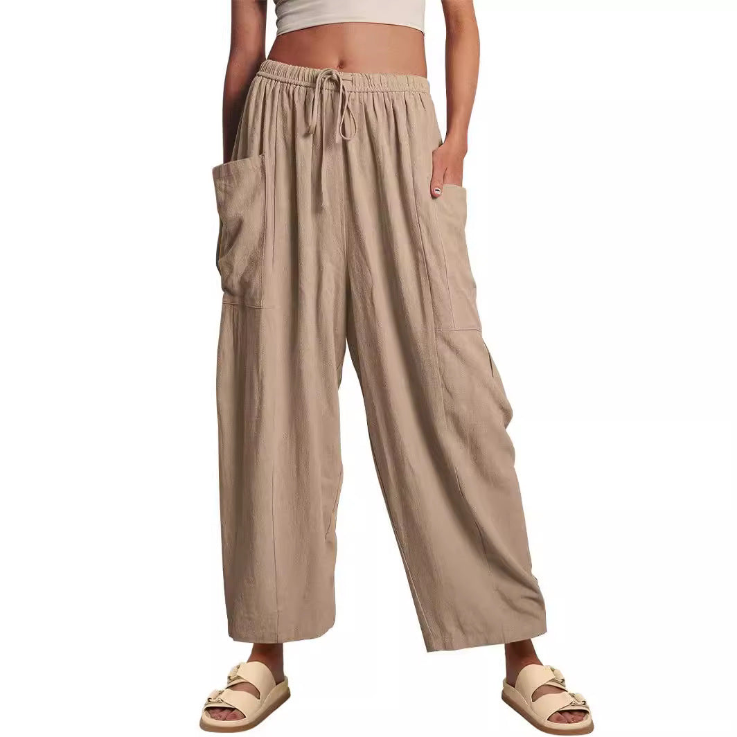 Pantalons met elastische taille, geplooid en met wijde pijpen