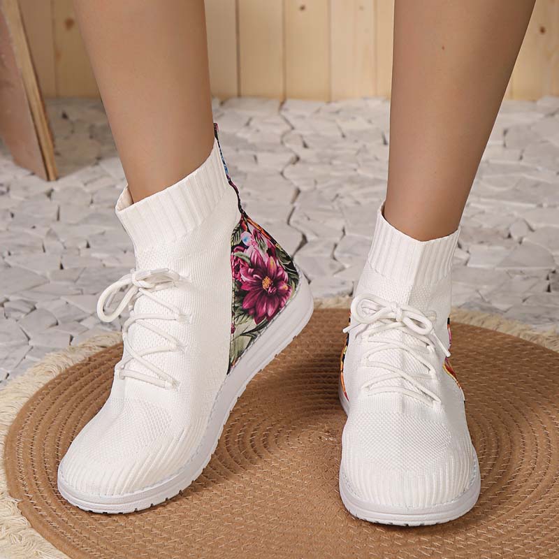 Comfortabele mid-high sneakers met bloemendetail op de hiel