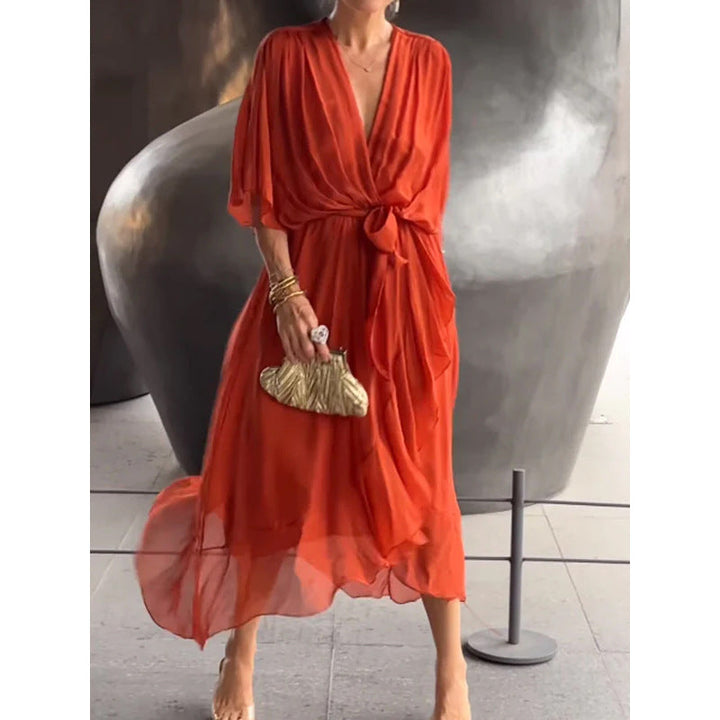 Batwing lange jurk met strikceintuur