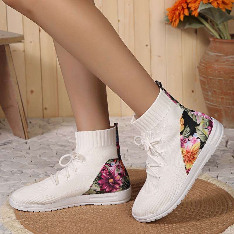 Comfortabele mid-high sneakers met bloemendetail op de hiel