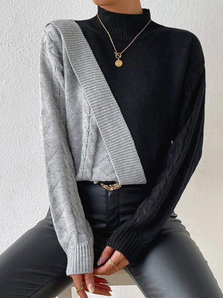 Dames twisted sweater met hoge kraag