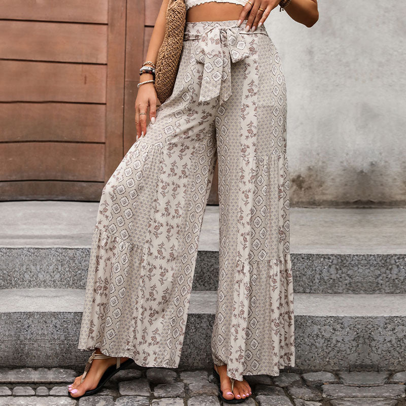 Losse broek met tribal print en strikdetail