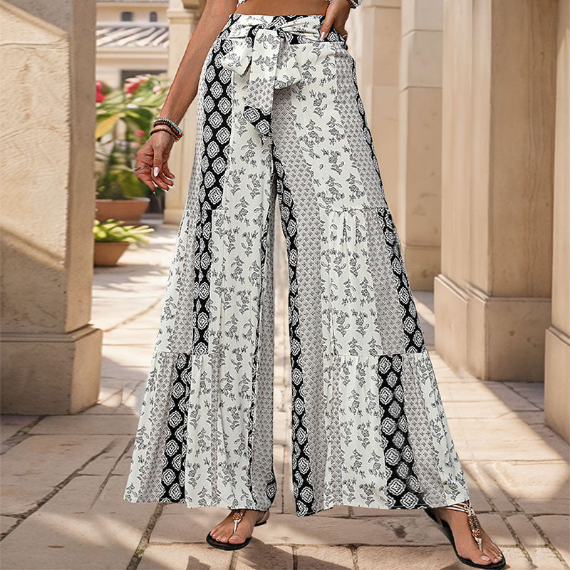 Losse broek met tribal print en strikdetail