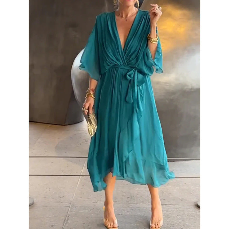 Batwing lange jurk met strikceintuur