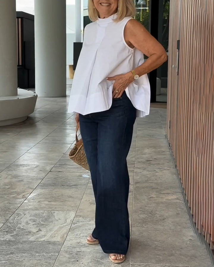 Eenvoudige mouwloze effen blouse