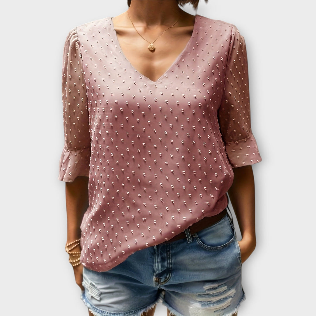 Blouse met diepe halslijn – Soft-Touch statement piece voor elegante avonden of weekendstyling