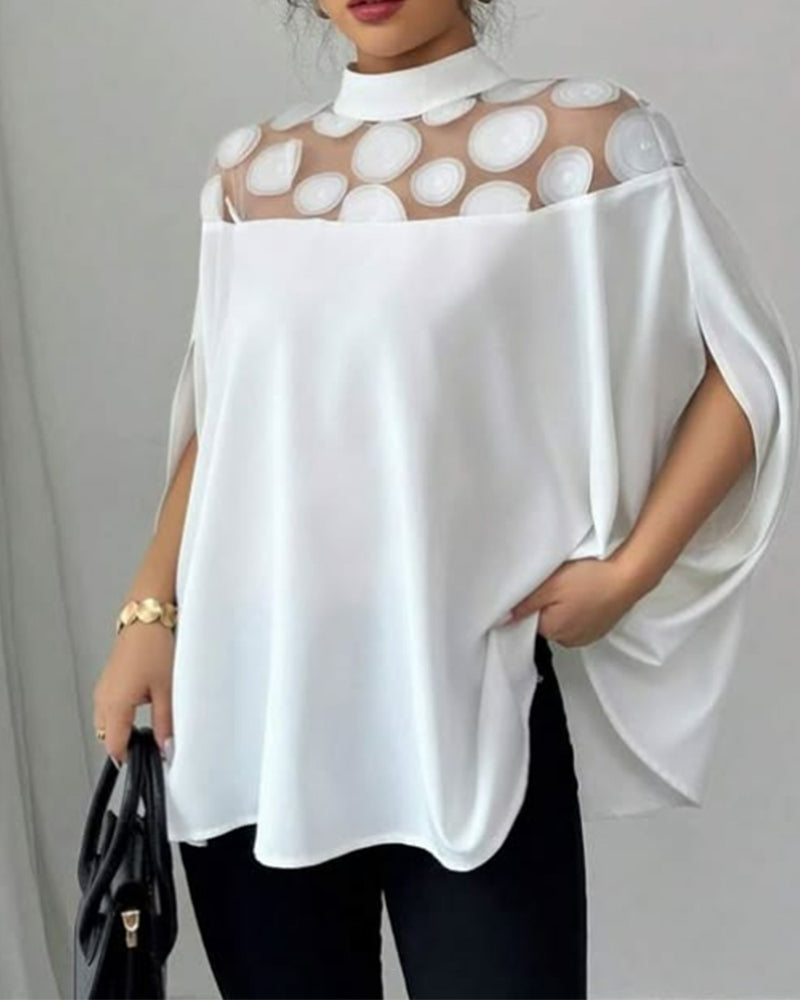 Top met elegante mouwen en shoulder cutouts