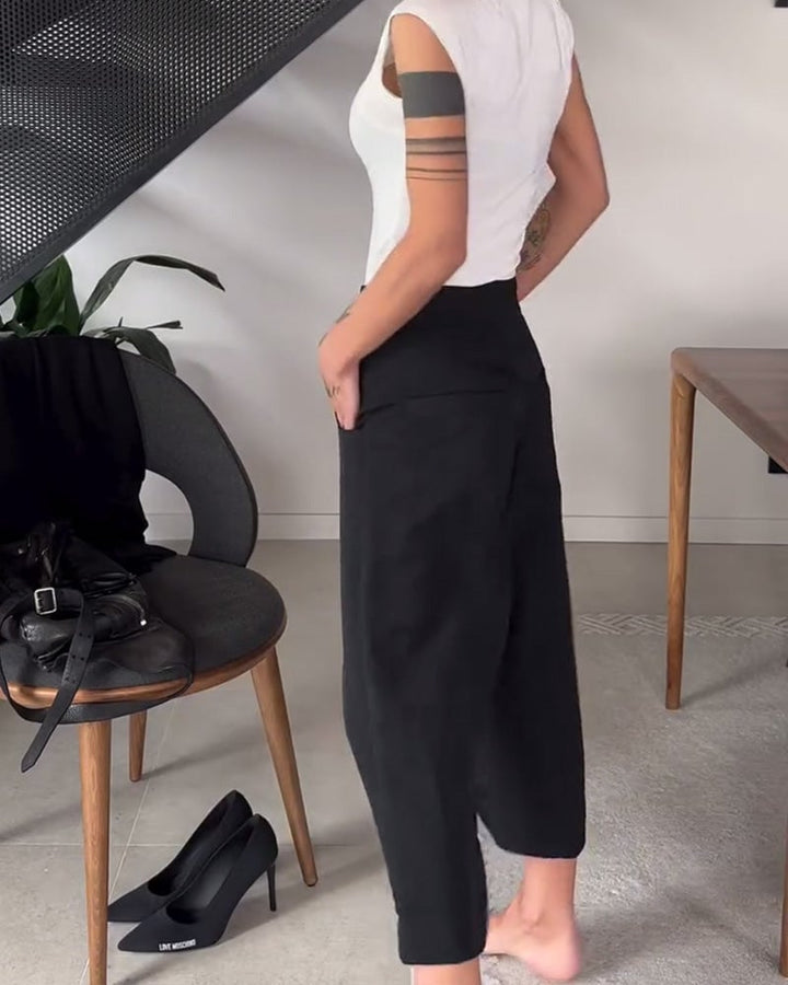 Eenvoudige effen asymmetrische casual broek