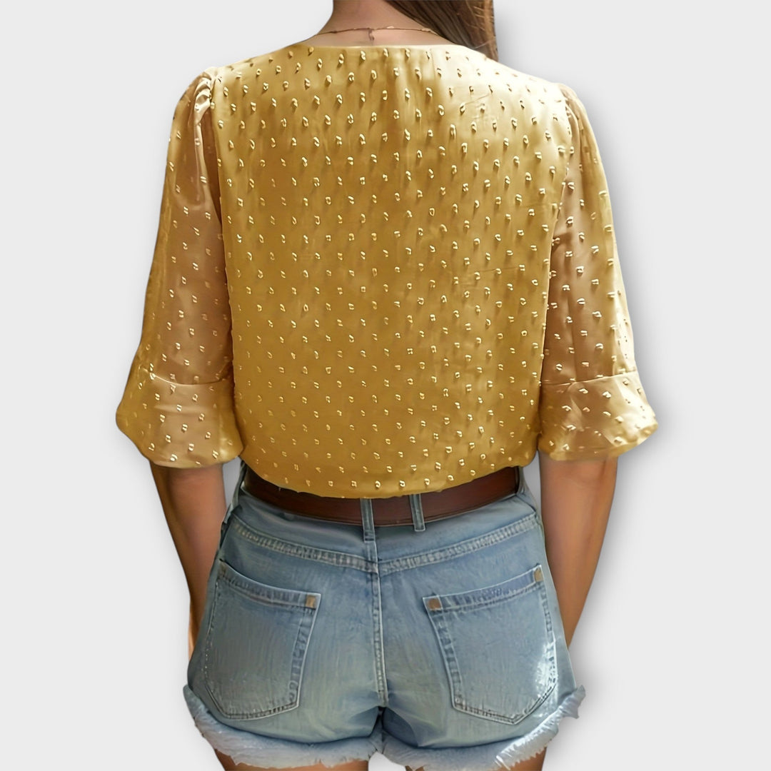 Blouse met diepe halslijn – Soft-Touch statement piece voor elegante avonden of weekendstyling