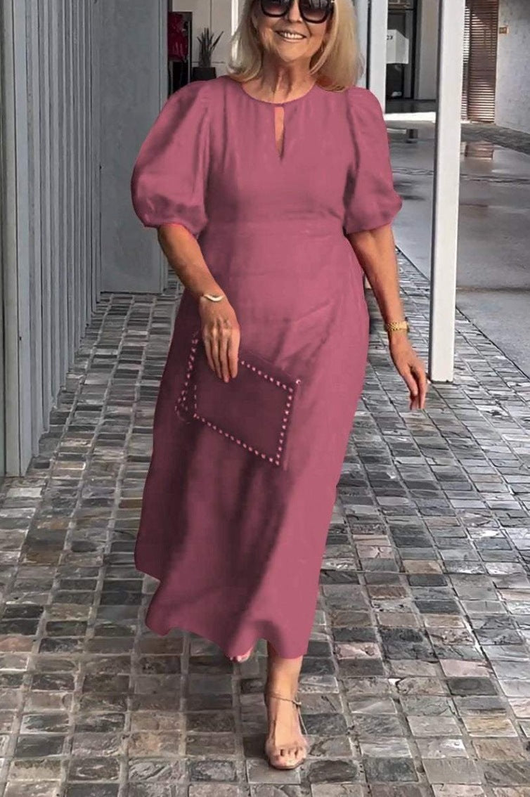 Elegante jurk met opvallende pofmouwen