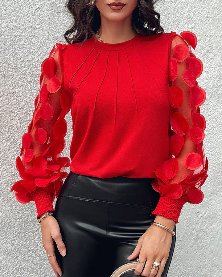 Geplooide blouse met driedimensionale decoratieve mouwen