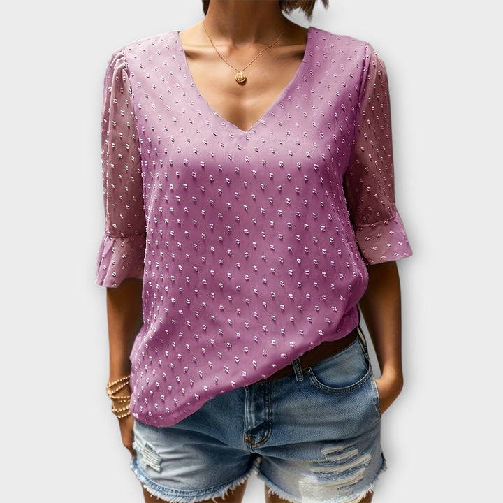 Blouse met diepe halslijn – Soft-Touch statement piece voor elegante avonden of weekendstyling