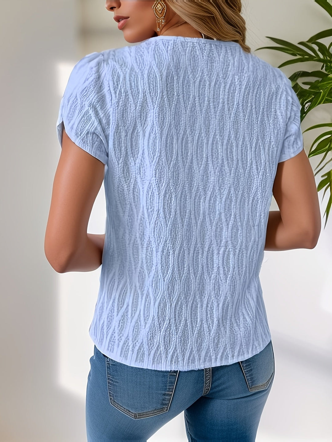 Asymmetrische top met één Petal Sleeve