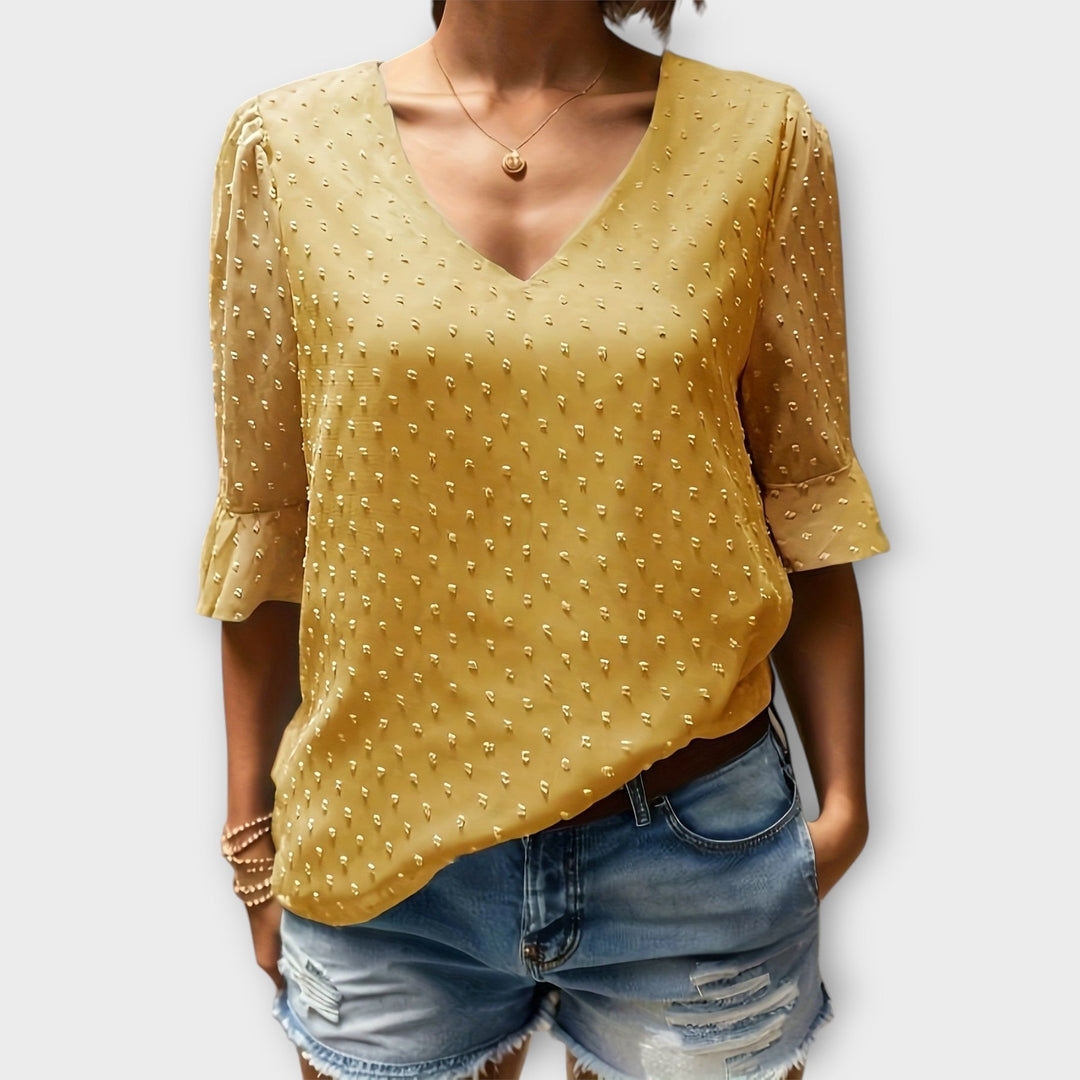 Blouse met diepe halslijn – Soft-Touch statement piece voor elegante avonden of weekendstyling