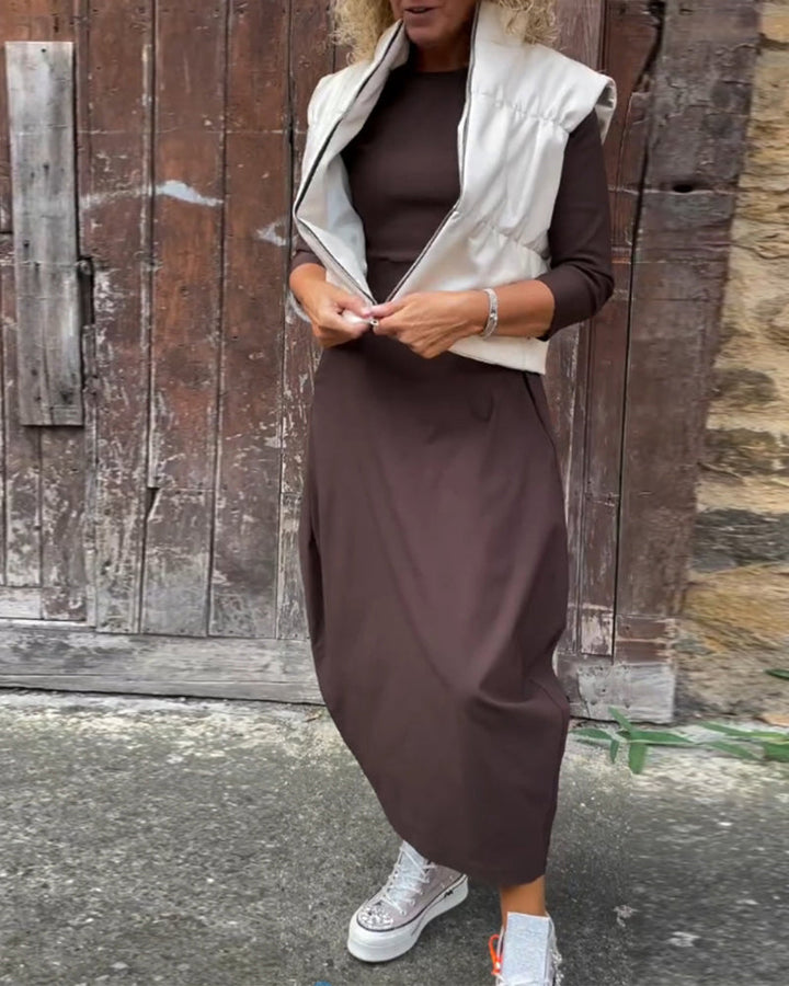 Elegante jurk met lange mouwen, zakken en een eenvoudige effen kleur