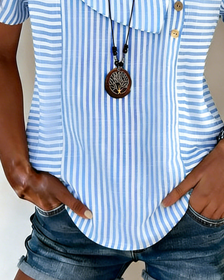 Asymmetrische blouse met gestreepte pofmouwen