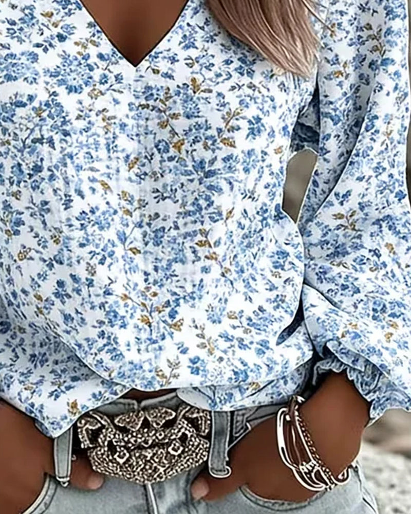 V-hals blouse met pofmouwen en bloemenprint