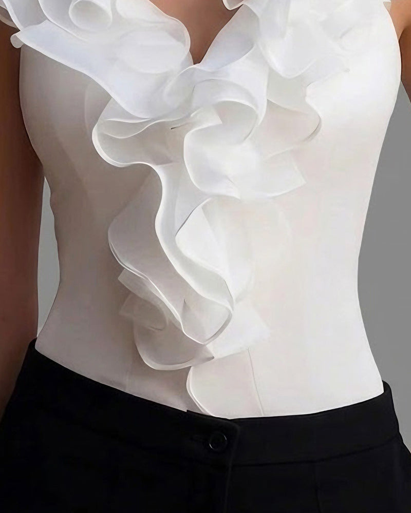 Mouwloze blouse met V-hals en lotusbladzoom