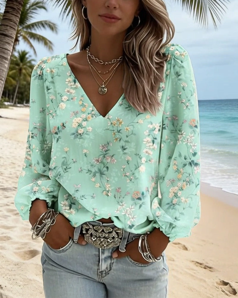 Bloemenblouse met V-hals en pofmouwen