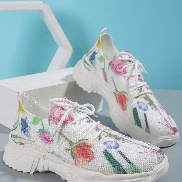 Ademende vetersneakers met bloemenprint