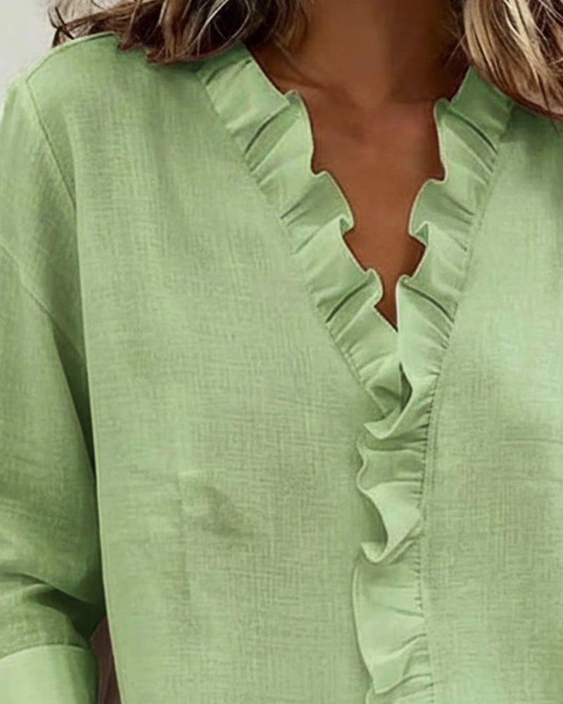 Ruffle V-hals blouse met lange mouwen