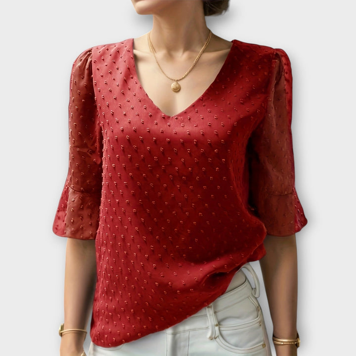 Blouse met diepe halslijn – Soft-Touch statement piece voor elegante avonden of weekendstyling