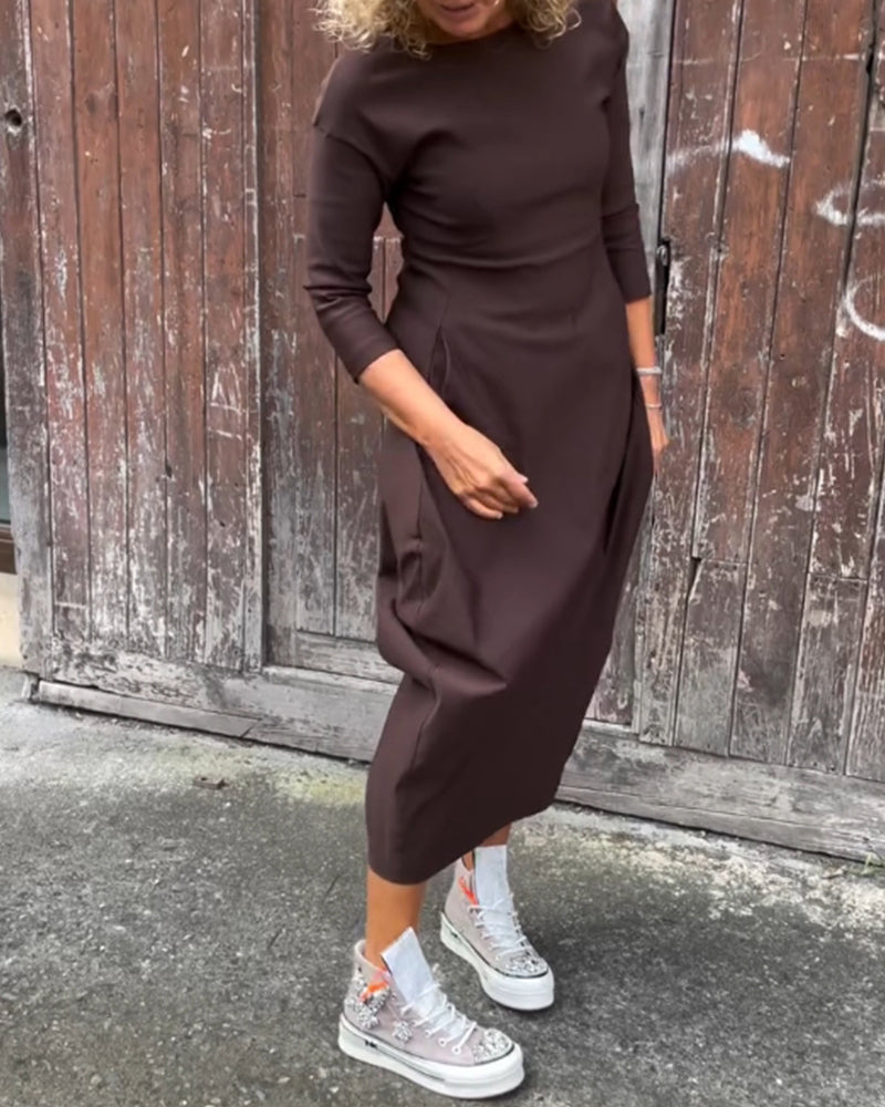Elegante jurk met lange mouwen, zakken en een eenvoudige effen kleur